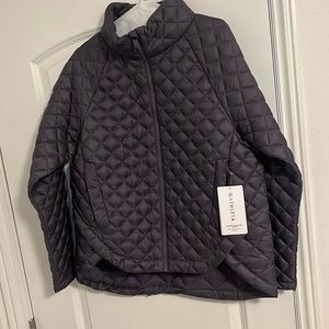 Women’s Athleta Whisper Featherless jacket. Eggplant color.